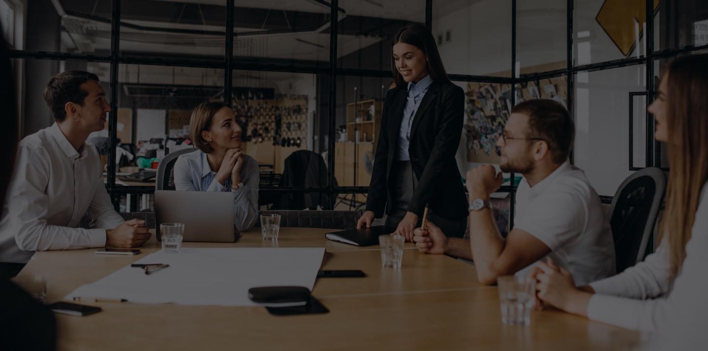 Group of people in an office meeting